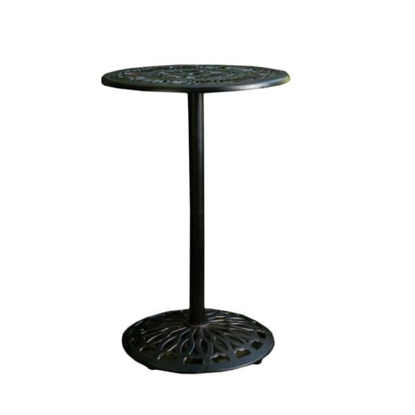 An outdoor table with an ornate base.
