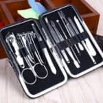 A manicure and pedicure toolset displayed in an open case.