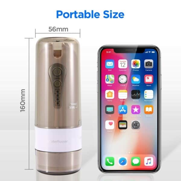 A portable water flosser is displayed next to a smartphone to highlight its compact size.