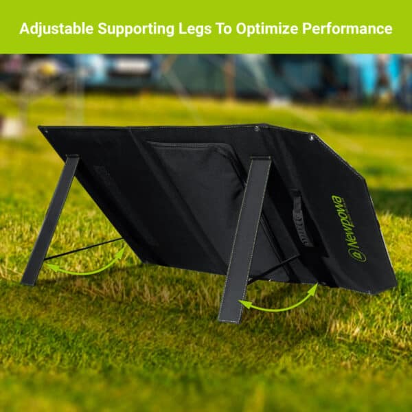A black portable ramp with adjustable supporting legs set on grass, highlighting its performance optimization feature.