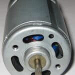 A dc electric motor with a visible commutator and a shaft with a d-cut.