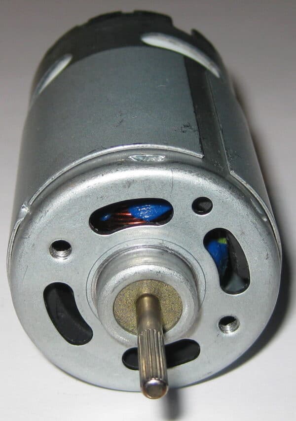 A dc electric motor with a visible commutator and a shaft with a d-cut.