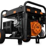 Portable gasoline generator on a frame with wheels.