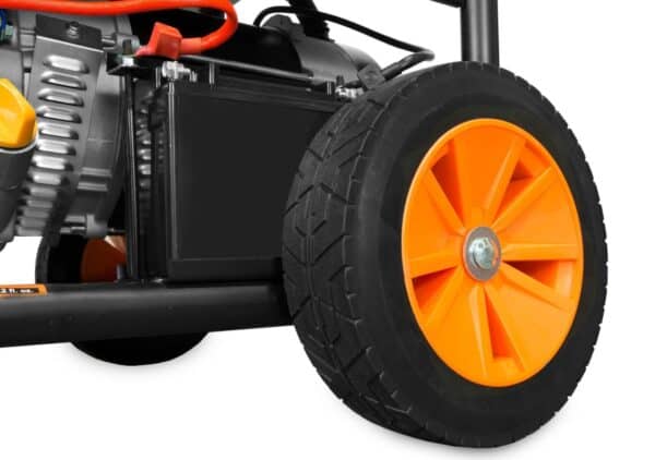 Close-up of an orange wheel on a lawn mower.