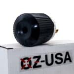 Black and silver electronic component mounted on a gray box with the label "x-usa" and a red prohibition sign.