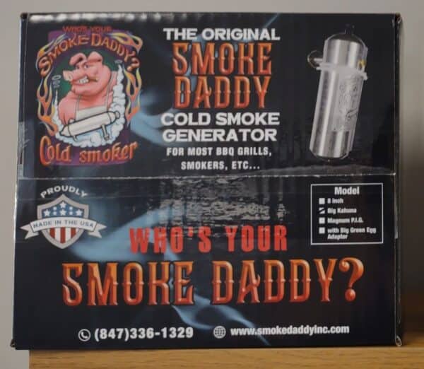 A box for a smoke daddy cold smoker generator with contact information and compatible grill models listed.