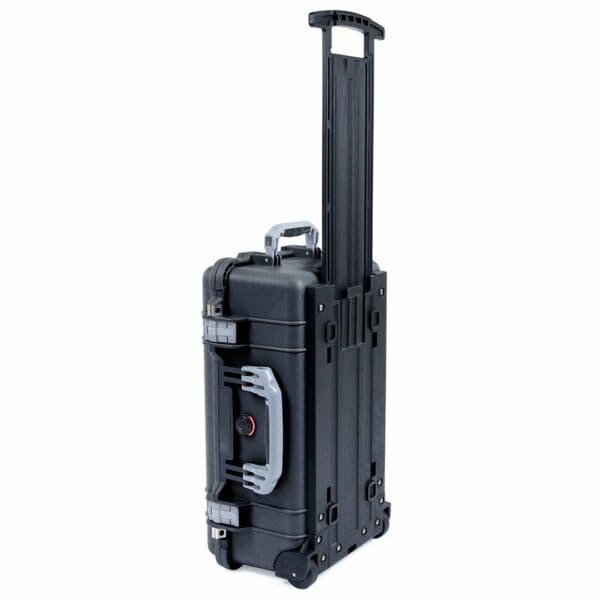 Black hard-shell rolling case with an extended handle.
