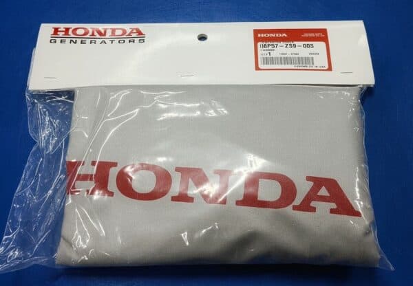 A packaged honda-branded item on a blue surface.