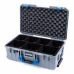 Hard protective case with customizable foam inserts and blue latches, open and empty, isolated on a white background.