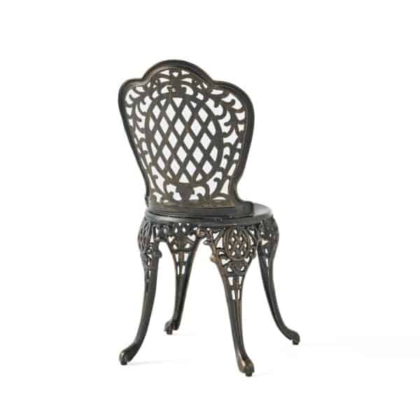 An ornate metal chair on a white background.