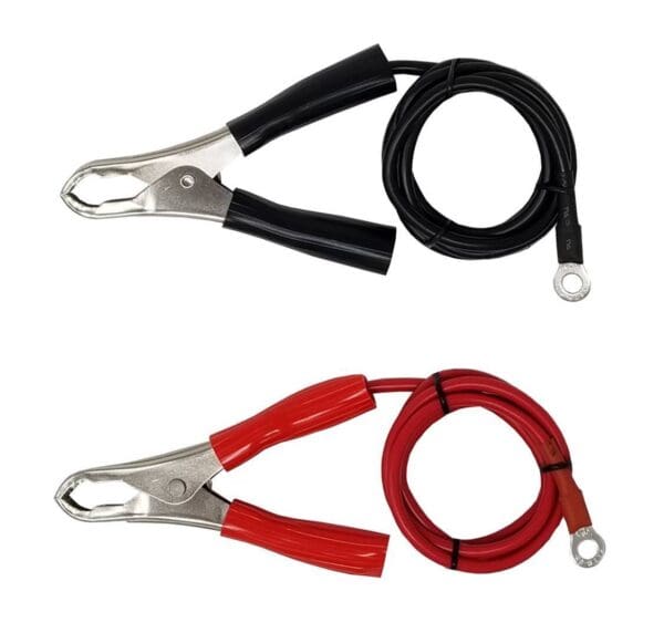 Two jumper cables with insulated handles; one with black handles and a black cable, the other with red handles and a red cable, isolated on white background.