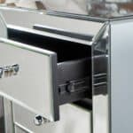 A mirrored chest of drawers with two drawers.