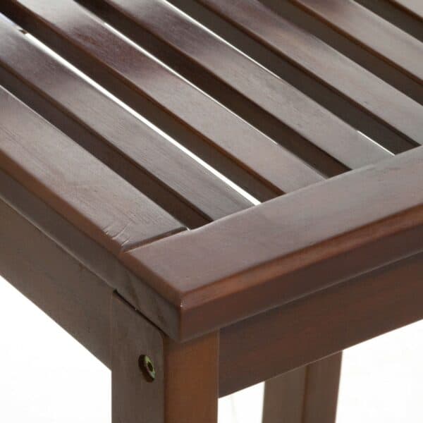 A close up of a wooden bench with slats.