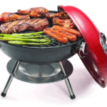 A grill with meat and vegetables on it.