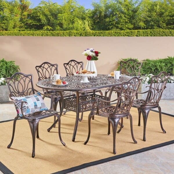 An outdoor dining set with a table and chairs.