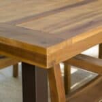 A close up of a wooden dining table.