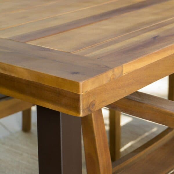 A close up of a wooden dining table.
