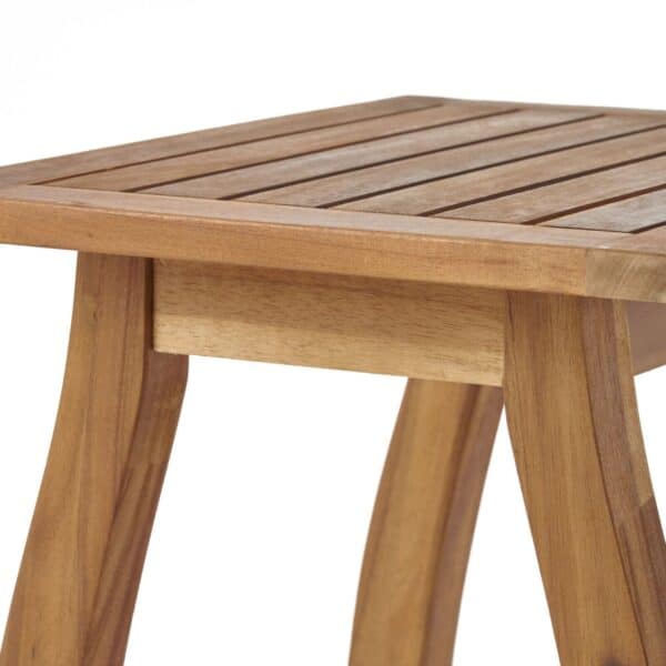 A teak side table with a wooden base.