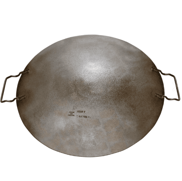 A round metal pan with handles on a white background.