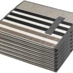 A stack of black and white striped coasters.