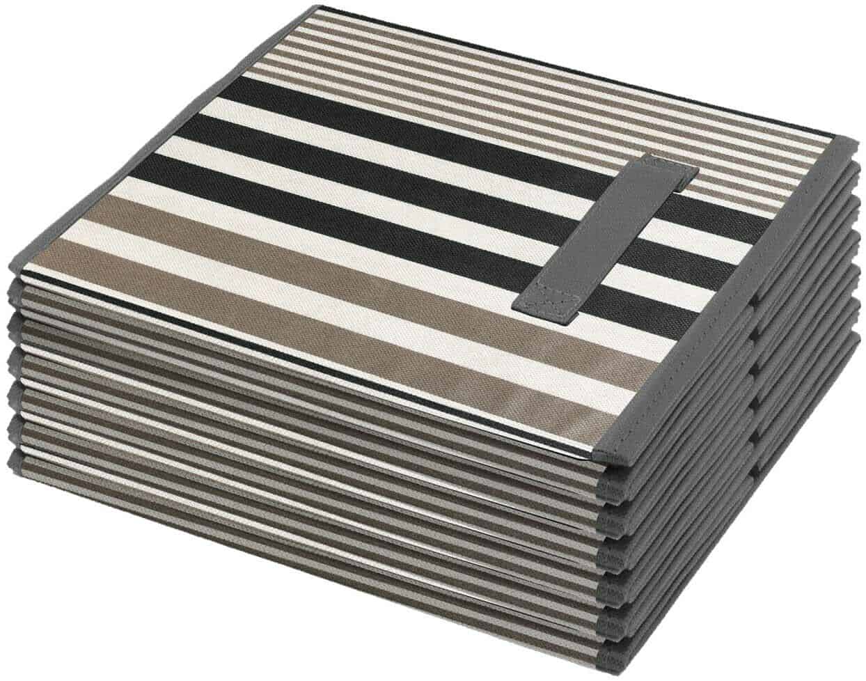 A stack of black and white striped coasters.