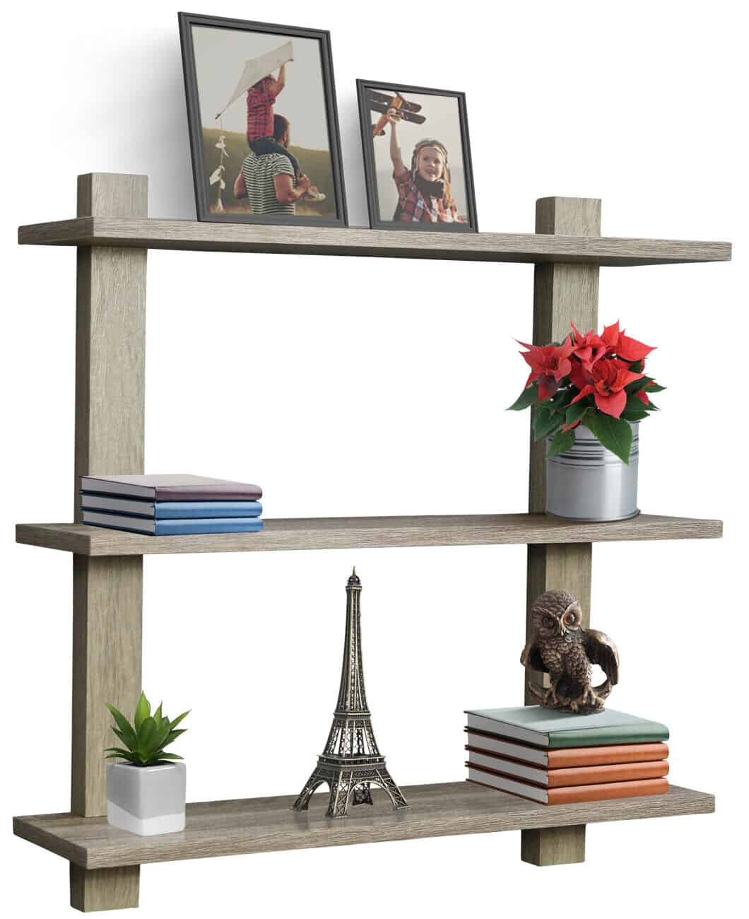 A wooden shelf with pictures and a vase on it.