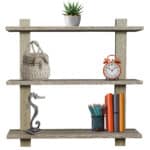 A wooden shelf with a clock, books and other items.