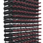 A wine rack with a lot of red wine bottles.