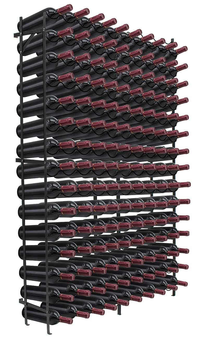 A wine rack with a lot of red wine bottles.