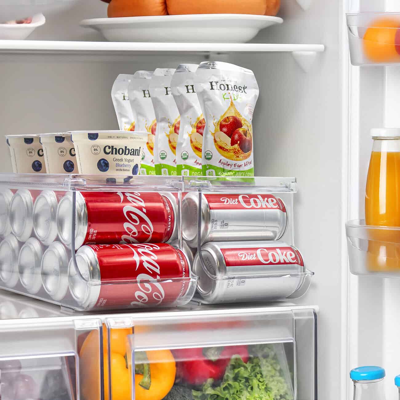 A refrigerator with a lot of food and drinks in it.