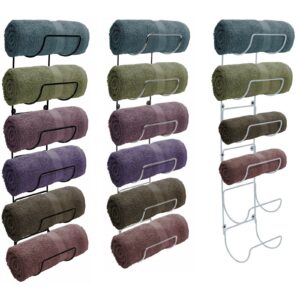 Four towel racks with different colors of towels.