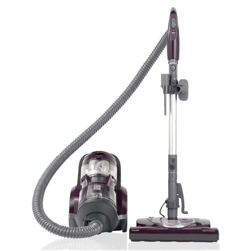 A purple vacuum cleaner with a black handle.