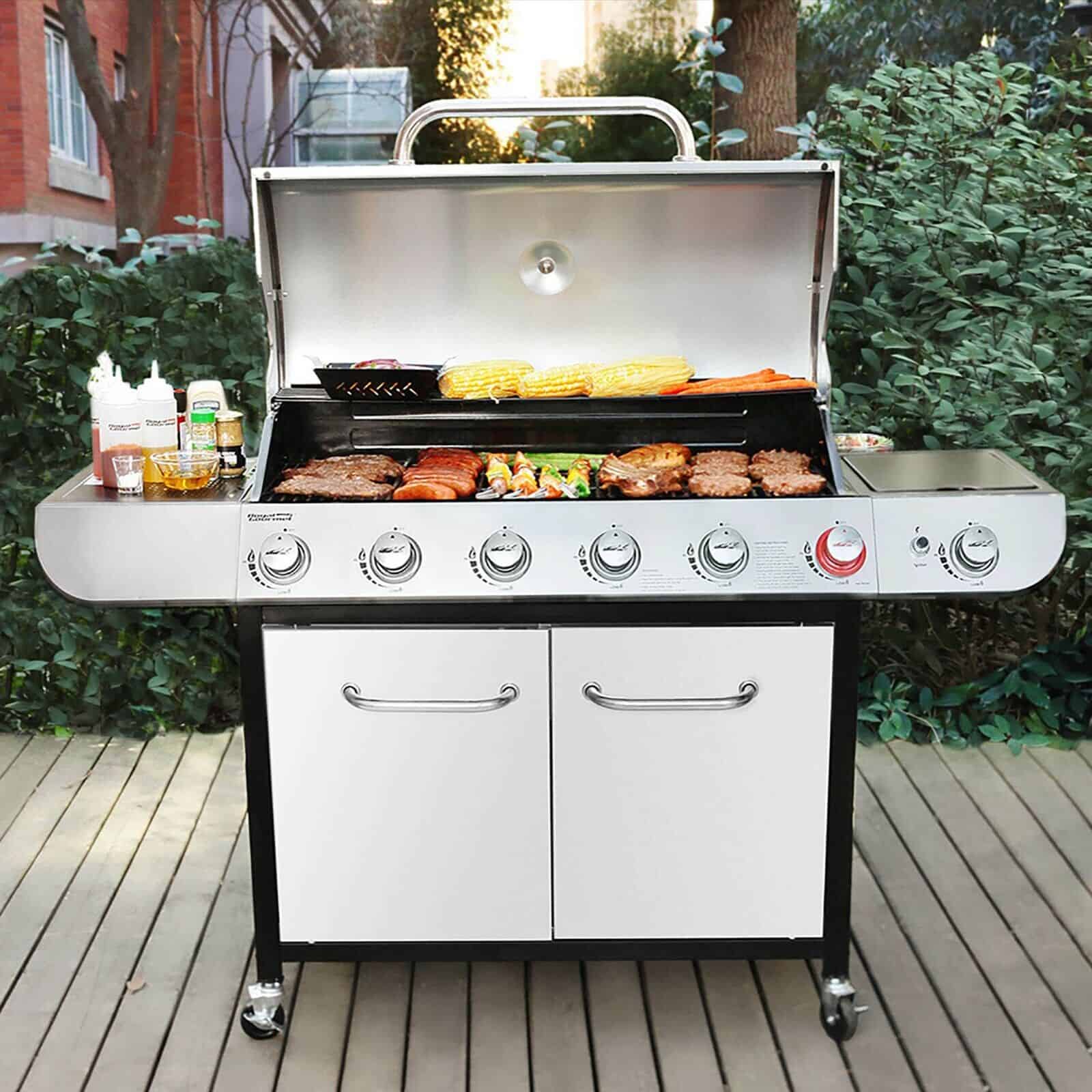 A gas grill with two burners and a side burner.