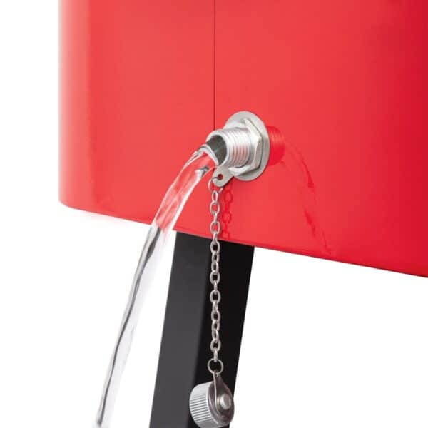 A red water fountain with a chain attached to it.