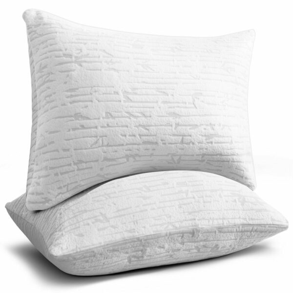 A pair of white pillows on a white background.