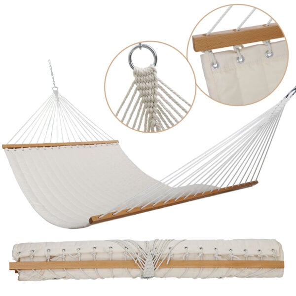 A white hammock with a wooden frame.