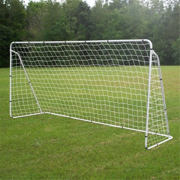 A soccer goal in the middle of a field.
