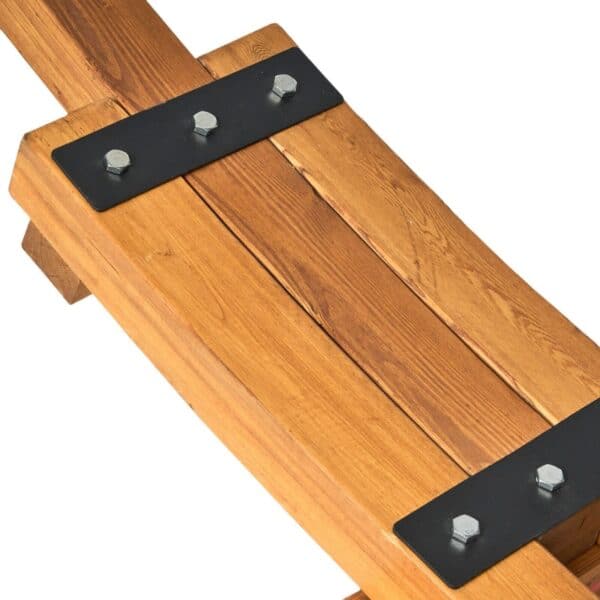 A wooden bench with black screws on it.