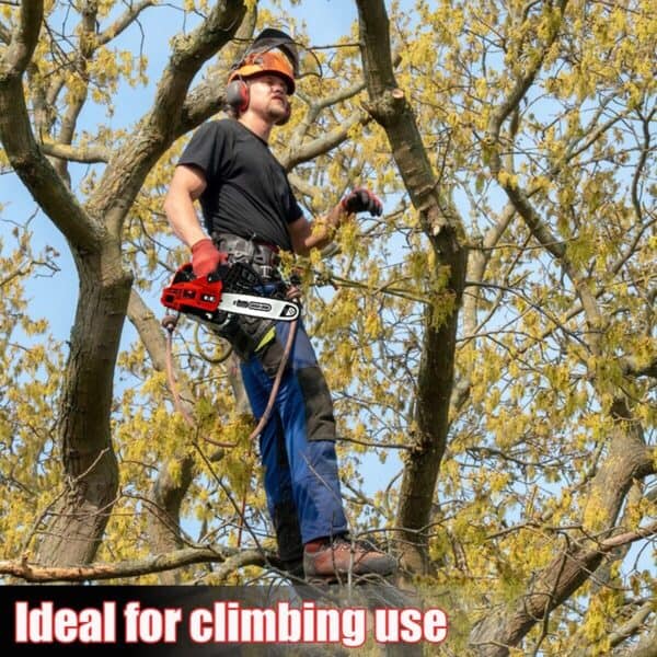 A man is climbing a tree with a chainsaw.