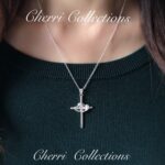 A woman wearing a necklace with the words cheri collections.