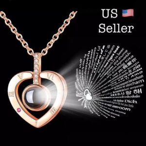 A heart shaped necklace with the words us seller on it.