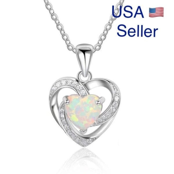 A sterling silver heart shaped opal necklace with a heart shaped opal.