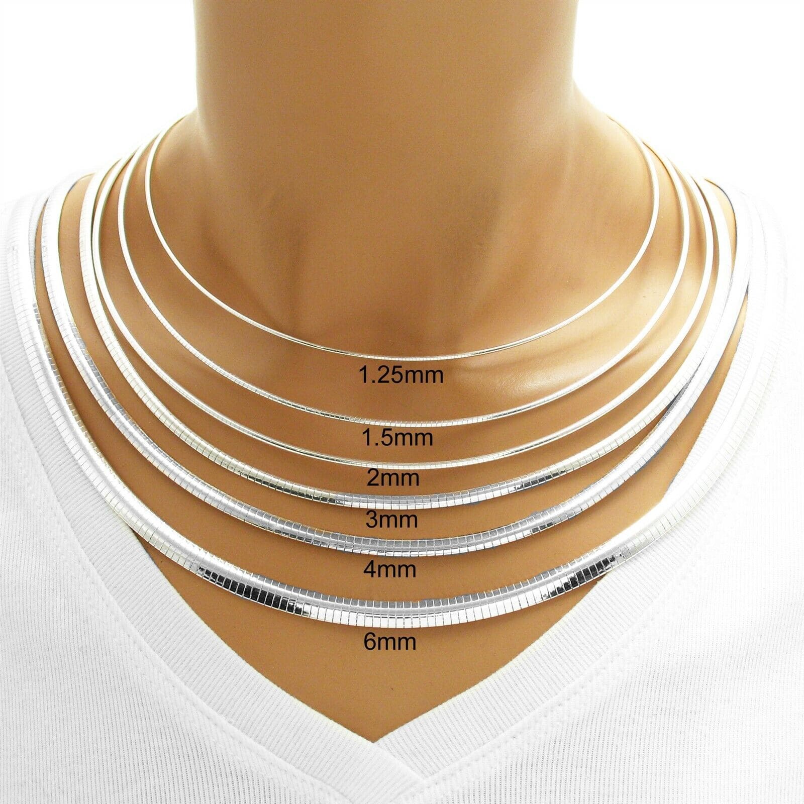 A mannequin's neck is shown with different lengths of necklaces.
