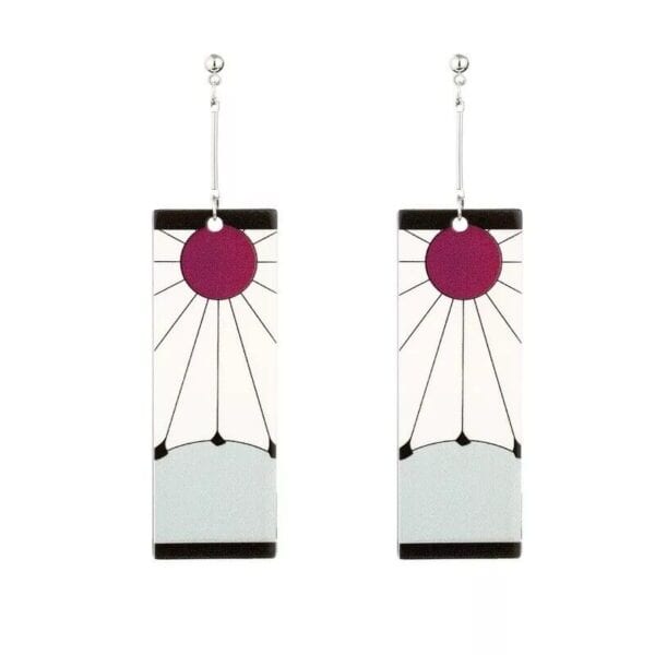 A pair of earrings with a pink and purple design.