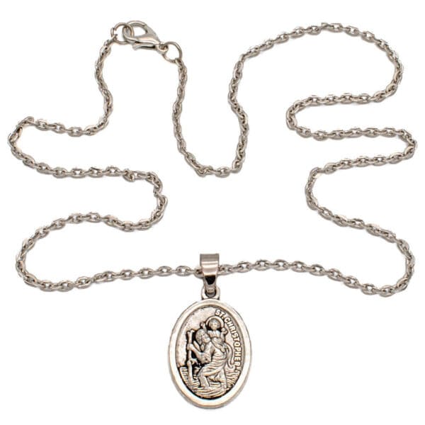 A sterling silver necklace with a st john the baptist medal.