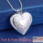 A silver heart locket necklace with the words fast & free shipping.