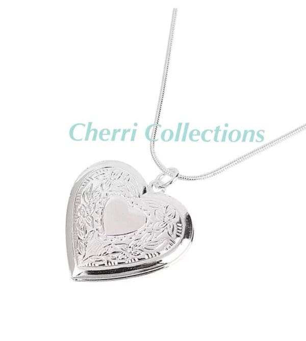 A heart shaped locket with a silver chain.