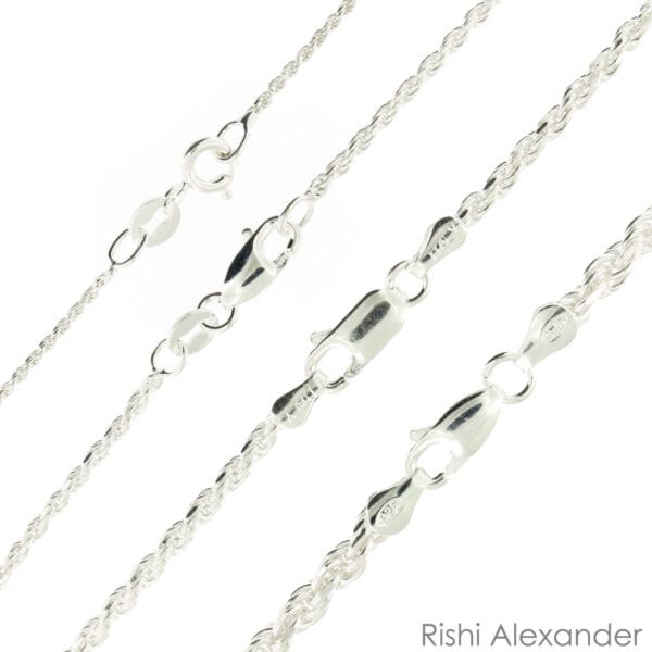 A set of sterling silver chains with different lengths.