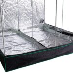 A grow tent with a black and silver cover.