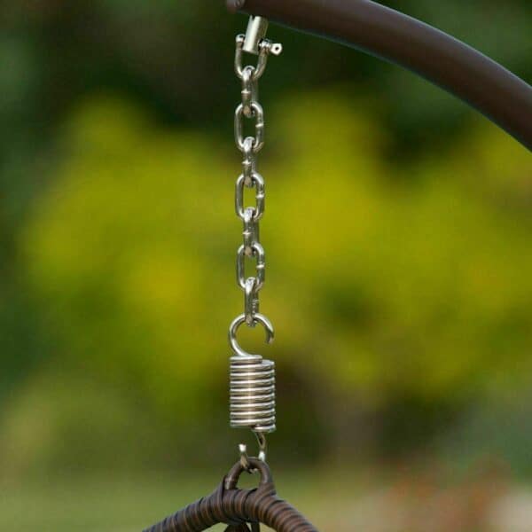 A swing with a chain attached to it.